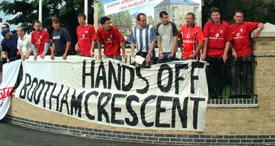 At the gates of Persimmon's new development: 'Hands off Bootham Crescent' banner displayed in style on smart new railings. Photo: Daley