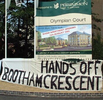 The railings at Persimmon's Olympian Court, decorated with our Hands off Bootham Crescent banner. Photo: Daley